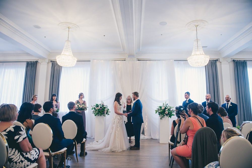 wedding ceremony in crystal ballroom for walper hotel wedding