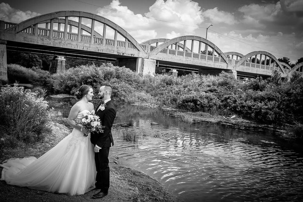 bride and groom at Schneider Park Kitchener overlooking the Grand River
