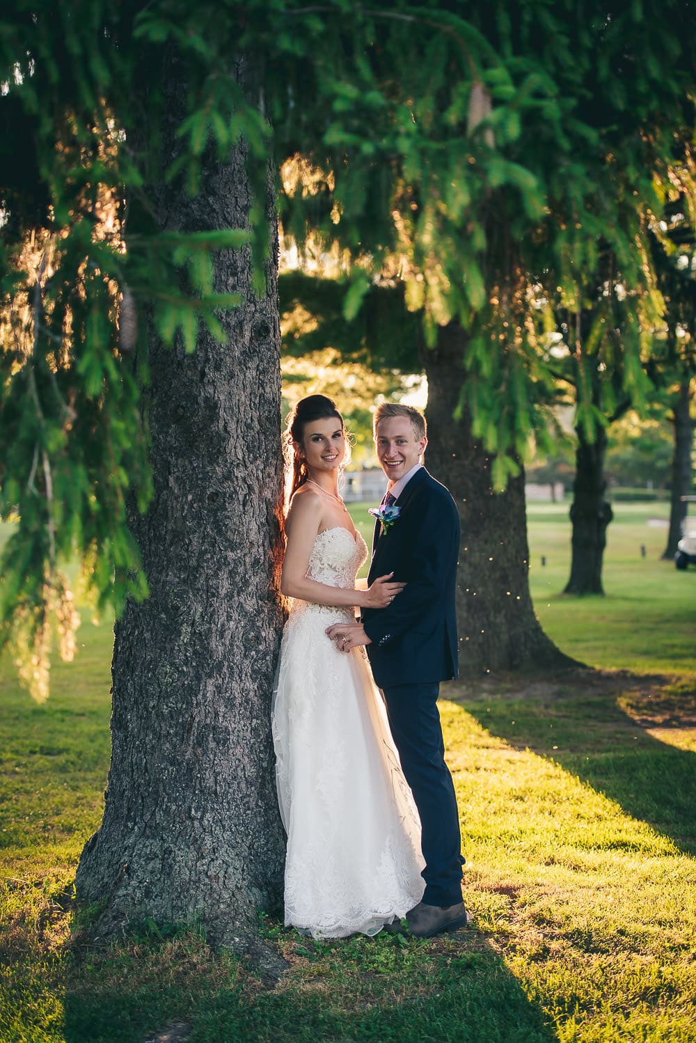 bride and groom wedding photo at golden hour in Mitchell golf club