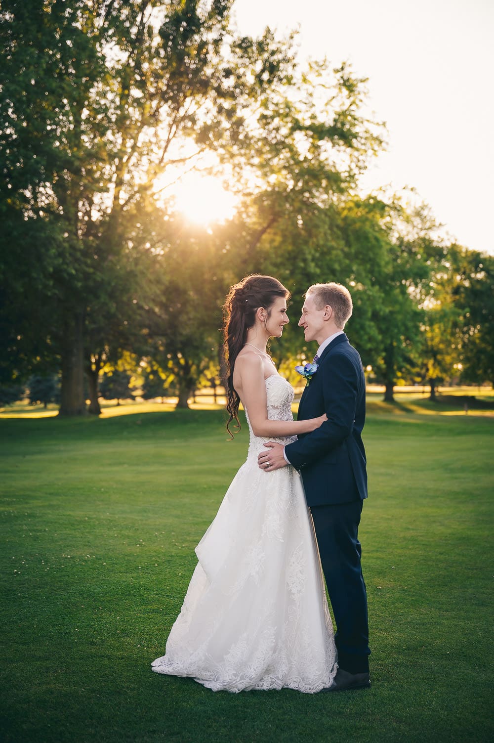 golden hour wedding photo on golf course in Mitchell Ontario