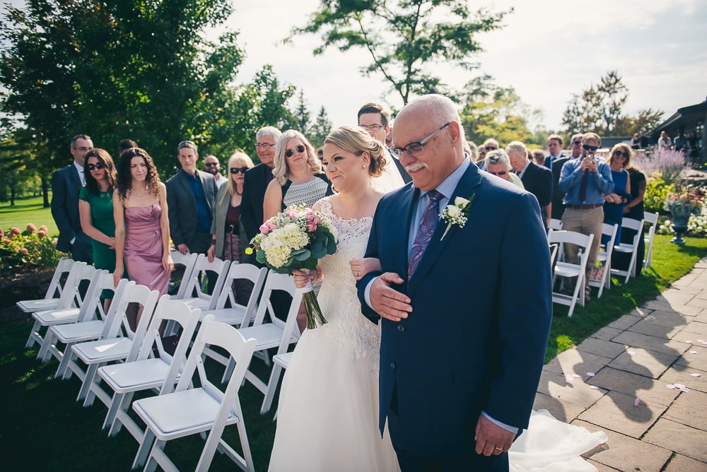 father walking daughter down the aisle at Stratford country club wedding