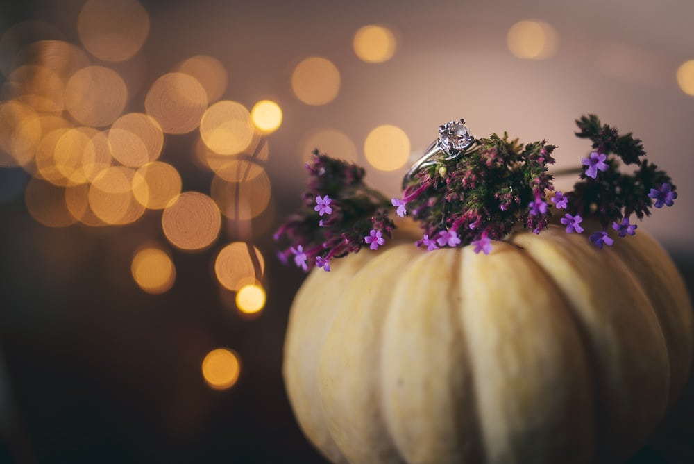 wedding ring photo with fall wedding theme