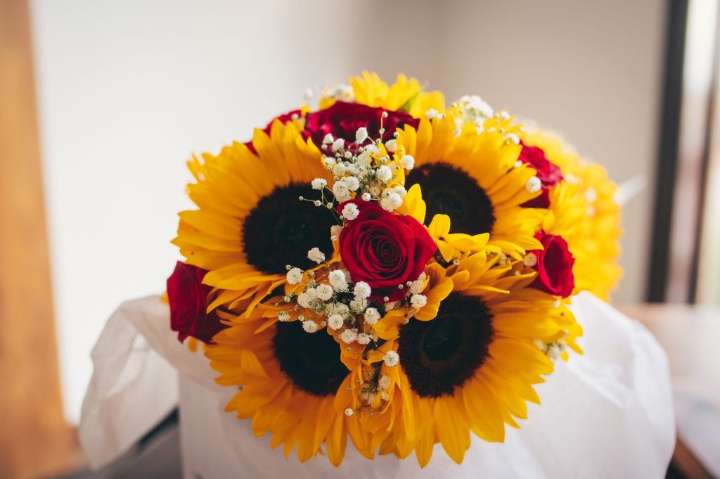 roses and the wedding industry